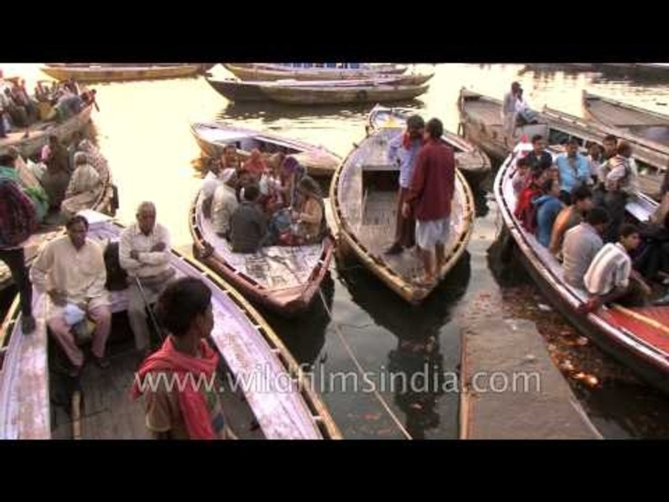 Devotees all set for a boat ride at the holy ganges of Varanasi ghats during Maha Shivratri