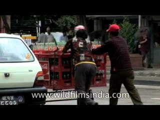 Cola-Cola bottle push-cart on Kathmandu street!