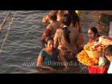 Women bathing in Ganges river during Shivratri, Varanasi