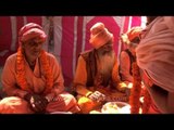 Mahashivratri bhandara in Varanasi - Adorning sadhus with Marigold garland