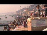 Devotees of Lord Shiva immersing in Ganga during Maha Shivratri, Varanasi
