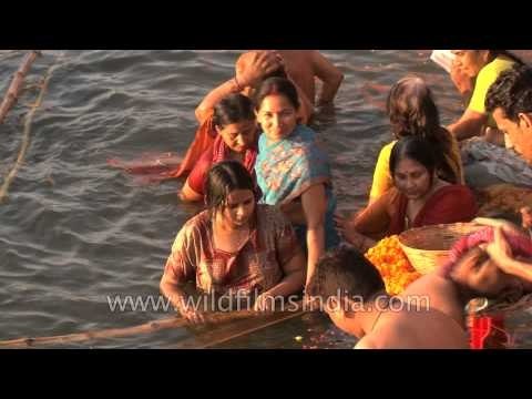 Hindu women bathe in the Ganges to observe Shivratri, Varanasi