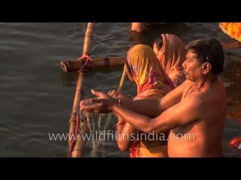 Devotees taking holy dip in River Ganges on the occasion of Mahashivratri