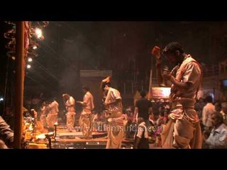 Ritualistic bell ringing creating an auspicious sound at Ganga Aarti in Varanasi