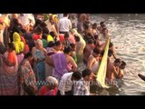 Pilgrims taking a holy dip at varanasi ghat on the occasion of Maha Shivratri