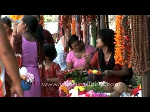 Flower vendor, outside the Jagat Guru Shri Shri 1008 Shri Shankracharya Mandir, Nepal