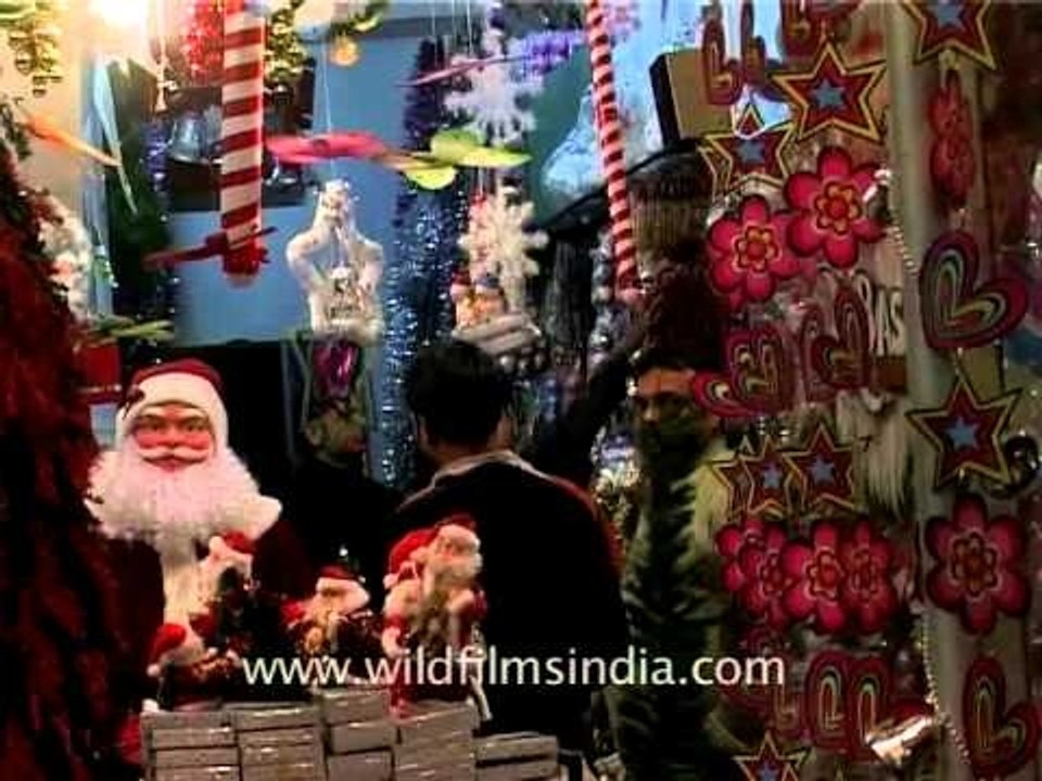 Shops selling santas, bells, stars during Chris...