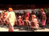 Sadhus having prashad during Bhandara at Juna Akhara on the ocassion of Maha Khumbh