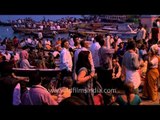 Multitude of hindu devotees in attendance for Ganga aarti at Dashaswamedh ghat, Varanasi