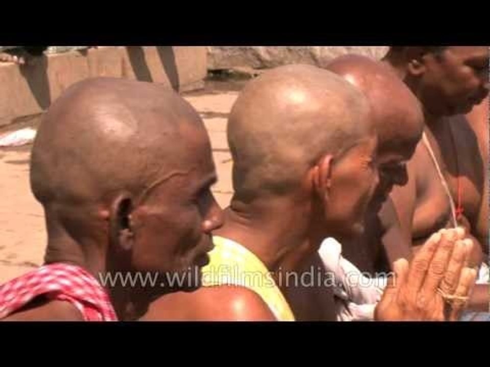 Tonsured Hindus on Varanasi ghat
