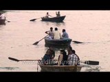 Tourists enjoying boating at the Holy river Ganga