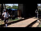 Danger: school children walking on Mumbai railway tracks