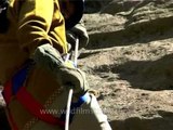 Students taking rappelling lessons near Manali in Himachal Pradesh, North India