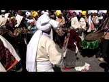 Men and women of rung community performing sword dance at kangdali procession
