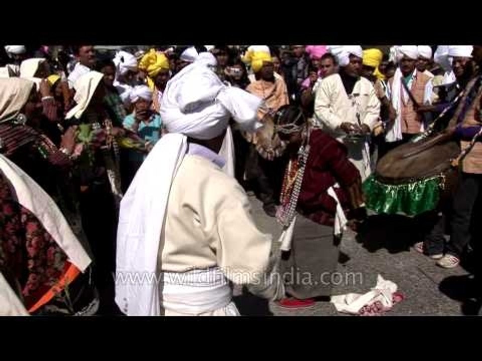 Men and women of rung community performing sword dance at kangdali procession