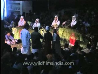 Kaaliyattam dancers dressed up in green leaves during Padayani Festival