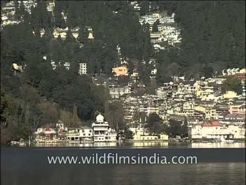 View of Naini Lake in the backdrop of Nainital city, Uttarakhand