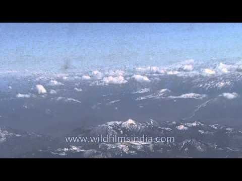 Snow Clad peaks of the Alps from an Airplane