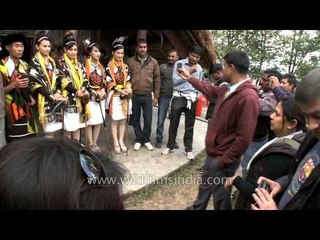 Fans get pictures taken with Tetseo Sisters at Hornbill Festival