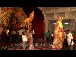 Devotees disassemble Durga pandal