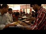 Devotees gathered to get prashad during Durga Puja