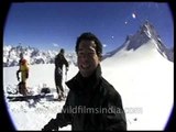 Snowboarders come face to face with an avalanche in the Himalayas