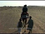 Riding on ship of the desert in Thar Desert, Jaisalmer