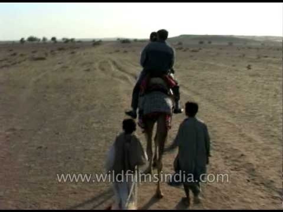 Riding on ship of the desert in Thar Desert, Jaisalmer