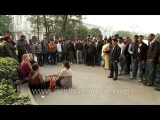 All these people patiently waiting to get into Starbucks? Madness!