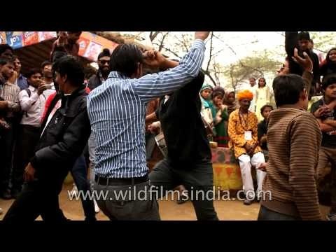 Visitors enjoying desi dhol beats at Surajkund Mela