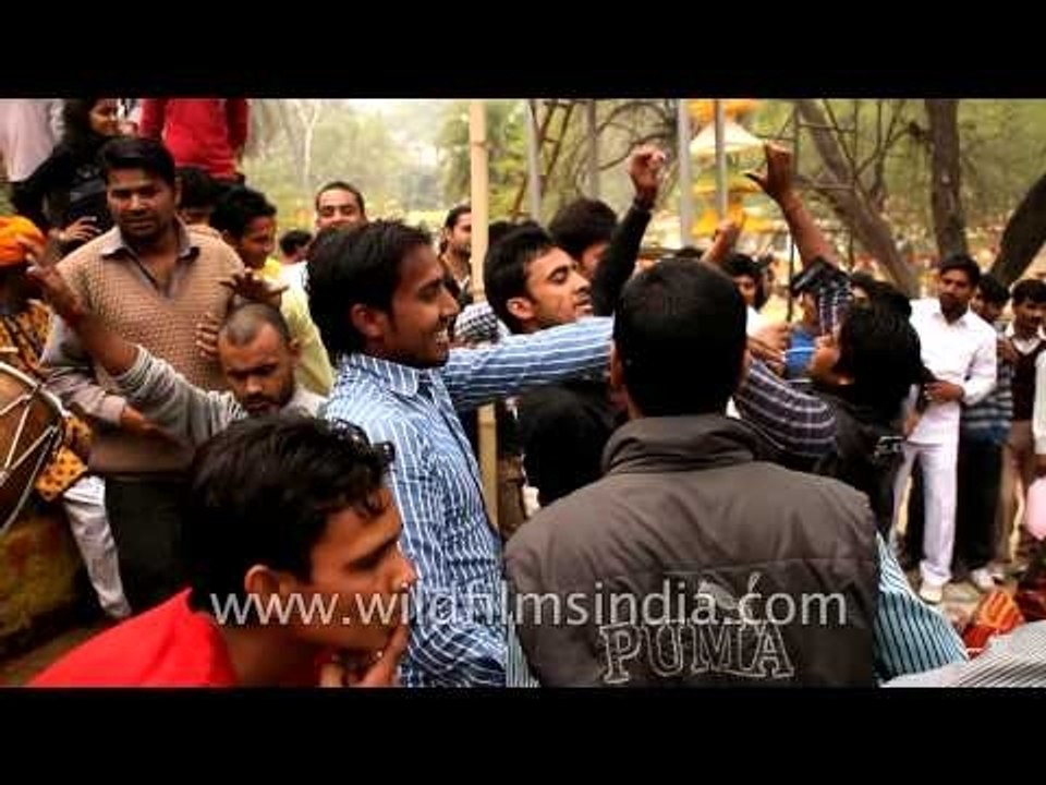 Dancing on the beats of Dhol at Surajkund International Craft Mela 2013