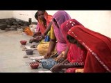 Handwork pottery by women in rural Uttar Pradesh, India
