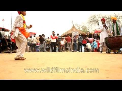 Folk dance being performed by a boy at Surajkund mela 2013