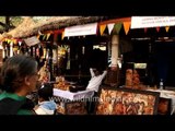 Paintings and crafts showcased at the International Surajkund Crafts Mela