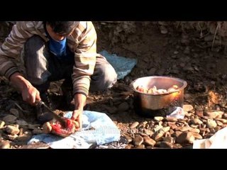 Chicken being cut for Trekkers' Dinner - Dzukou valley, Nagaland