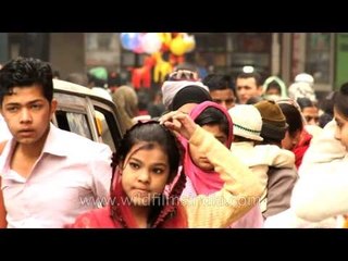 Muslim men wearing taqiyah and women in hijab is a common sight in Nizamuddin Basti
