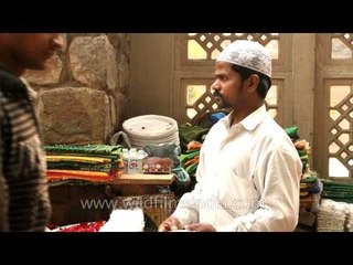 Praying material business for muslims at Nizamuddin market, Delhi