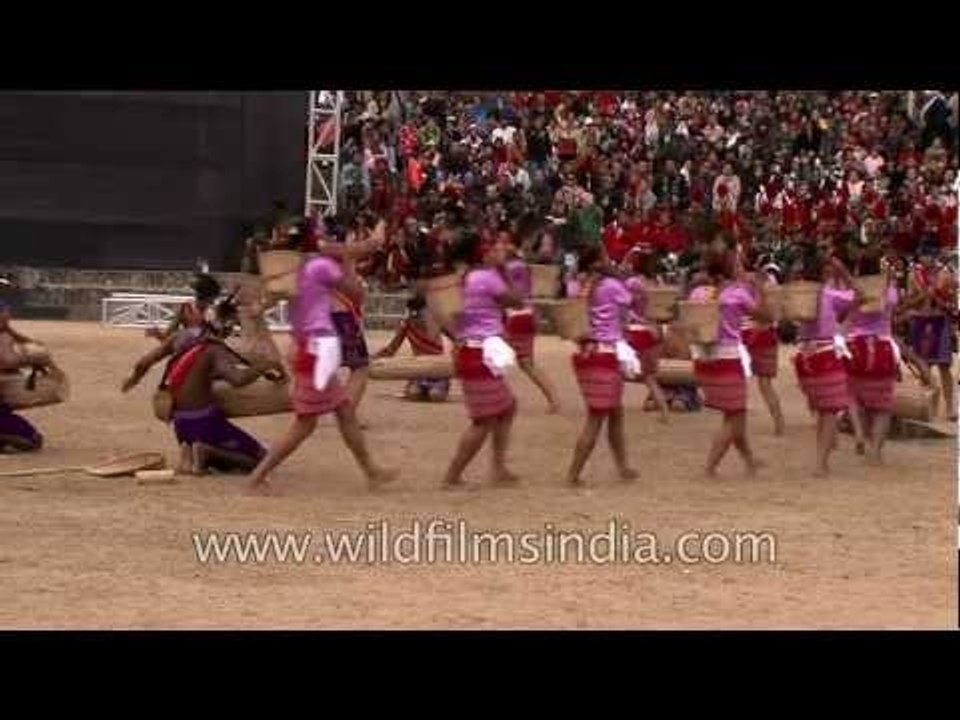 Garo tribal men playing drums while women dance to the beat!