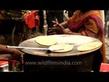 Paratha fry in a huge frying pan, Nizamuddin West