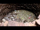 Once a clear spring of groundwater- now a rubbish dump at the Baoli in Wazirpur Group of Monuments!