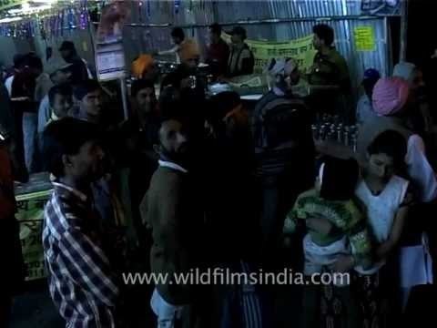 Devotees dance to religious songs at night, Amarnath yatra