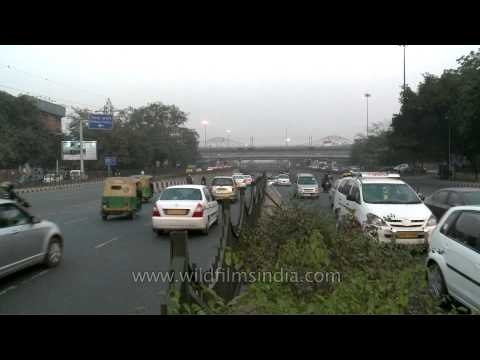 Time lapse of vehicles passing through the busy ring road at Moolchand, Delhi