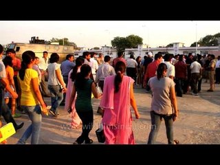 Spectators reach the 2010 XIX Commonwealth Games venue in Delhi