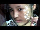 Face painting at Hornbill festival Night Bazar, Nagaland