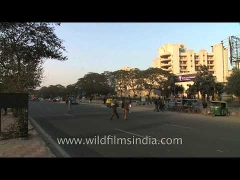 Traffic below violet line metro bridge near Jasola Apollo metro station