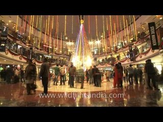 Crowd in fast motion at Select citywalk during New Year's eve.