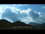 Time lapse of clouds moving above mountains - Dzukou Valley