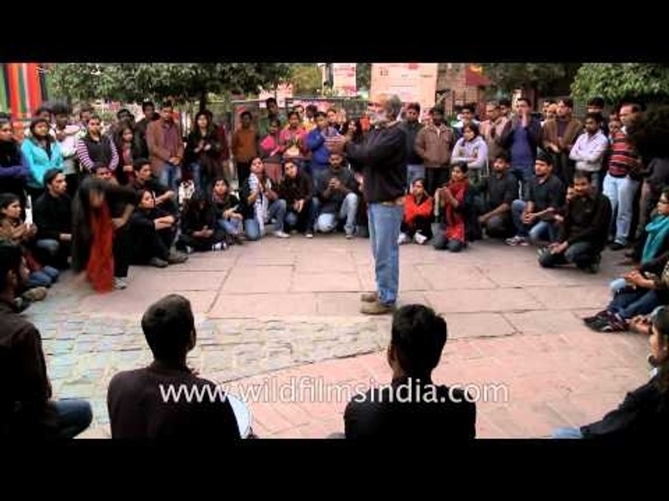 Arvind Gaur, head of Asmita group talks to the audience after the play against rape - Delhi Haat
