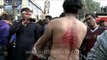 Shiite Muslims bleed as they flagellate themselves during Muharram