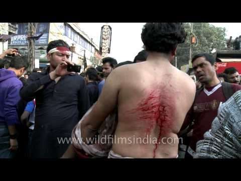 Shiite Muslims bleed as they flagellate themselves during Muharram